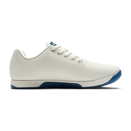 Stadium White Outwork Shoe Medial Side Angle.