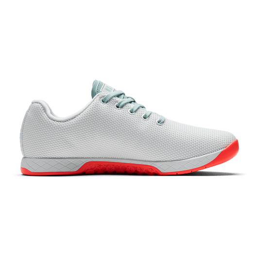 Classic White Fiery Coral Outwork Shoe Medial Side Angle.