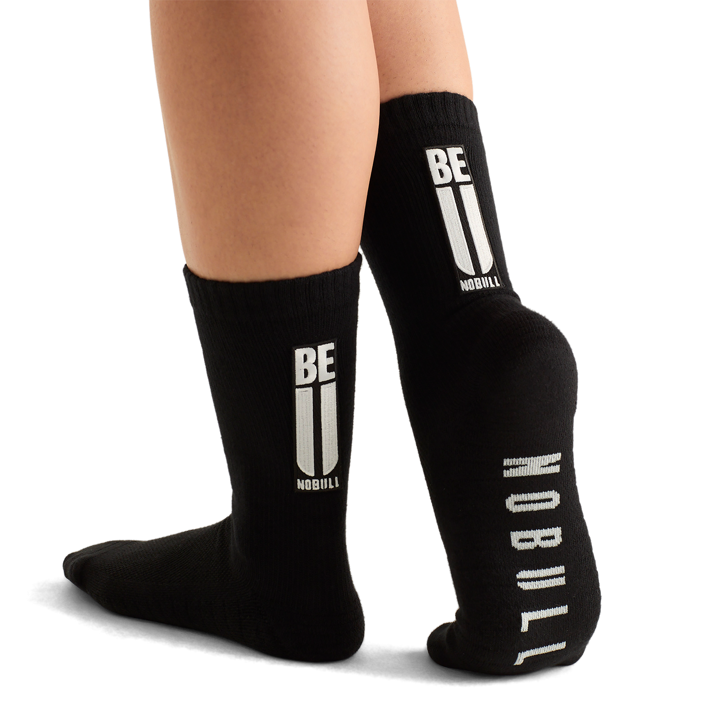 Woman Wearing Black Be U Crew Sock.