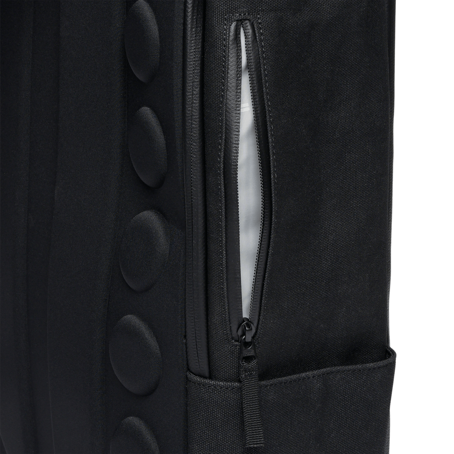 Black Waxed Canvas Backpack Side Zipper Pocket Angle
