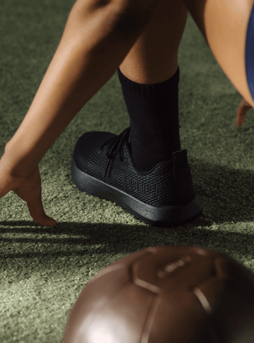 Woman working out in Drive Mesh shoes.