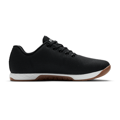 Black White Gum Outwork Shoe Medial Side Angle.