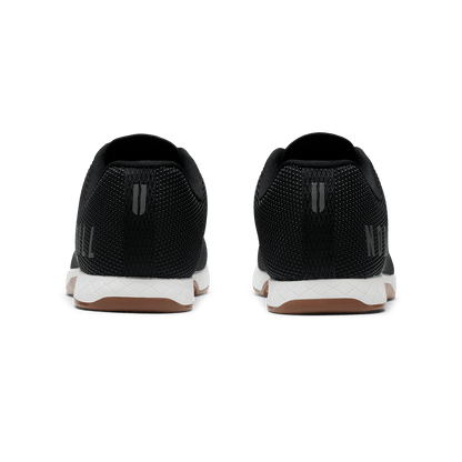 Black White Gum Outwork Shoe Back Angle.