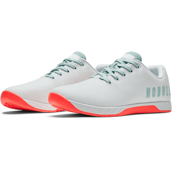 Classic White Fiery Coral Outwork Shoe Front Side Angle.