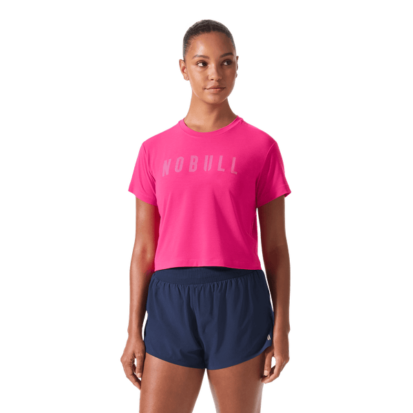 Women's Signal Pink NOBULL Boxy Tee Front Waist Up Angle.