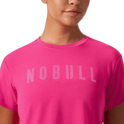 Women's Signal Pink NOBULL Boxy Tee Front Detail Angle.
