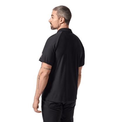 Men's Black NOBULL All Fore It Polo Shirt Back Waist Up Angle.