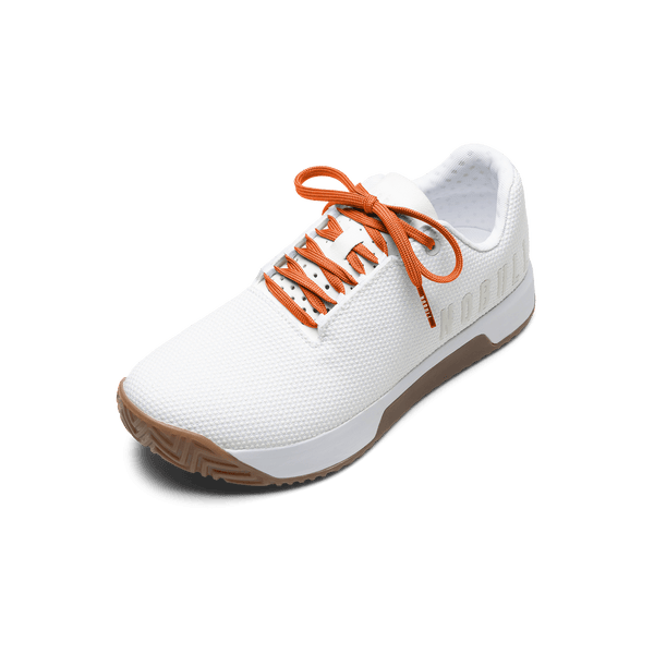 White Outwork Edge Shoe with Scarlet Shoelaces.