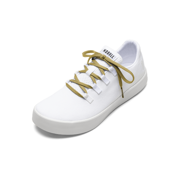 White Recs Canvas shoes with Ginger Laces.