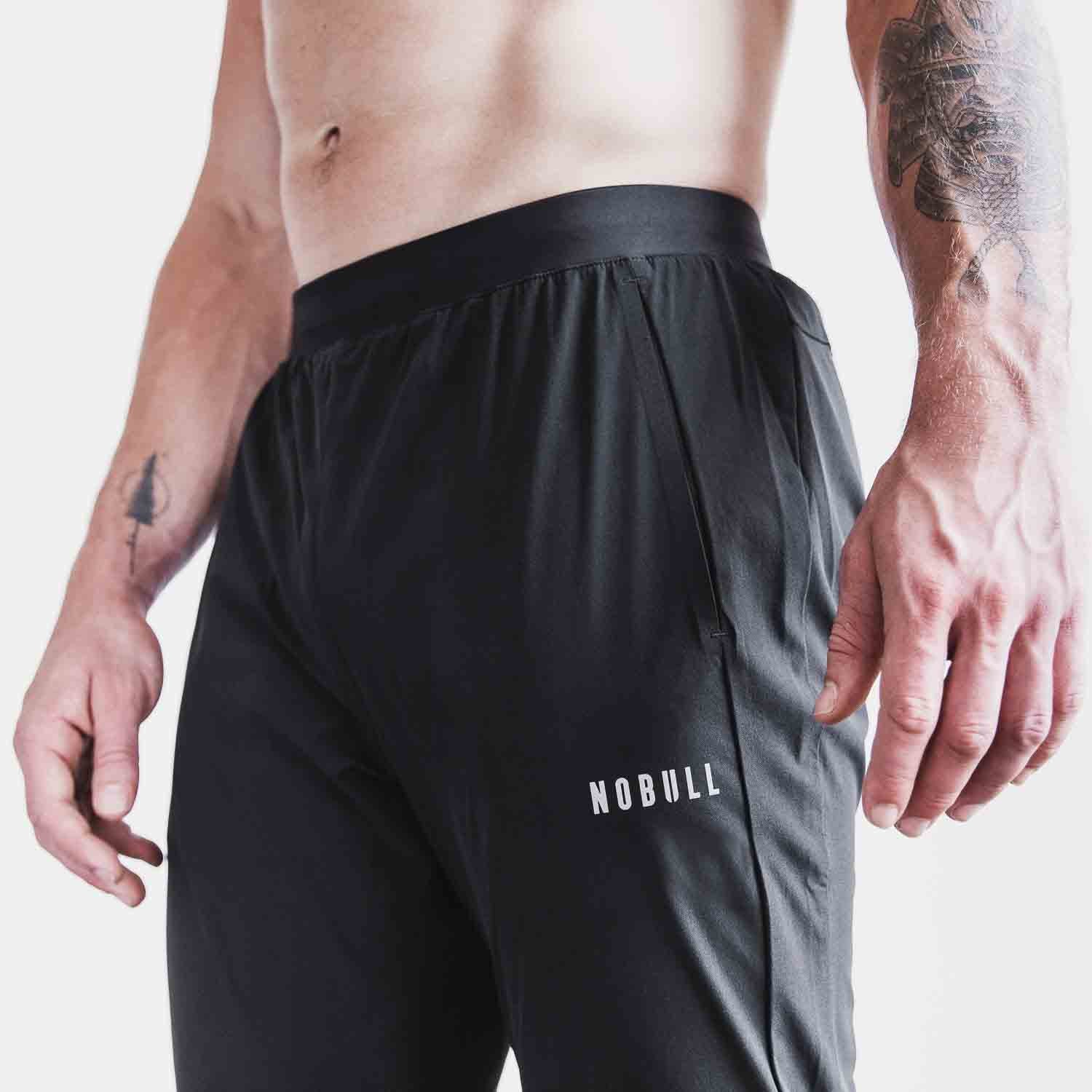New Balance Men's Impact Run Woven Pant, Black, Medium : :  Clothing, Shoes & Accessories