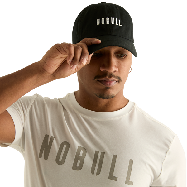 Man wearing black NOBULL hat - front facing