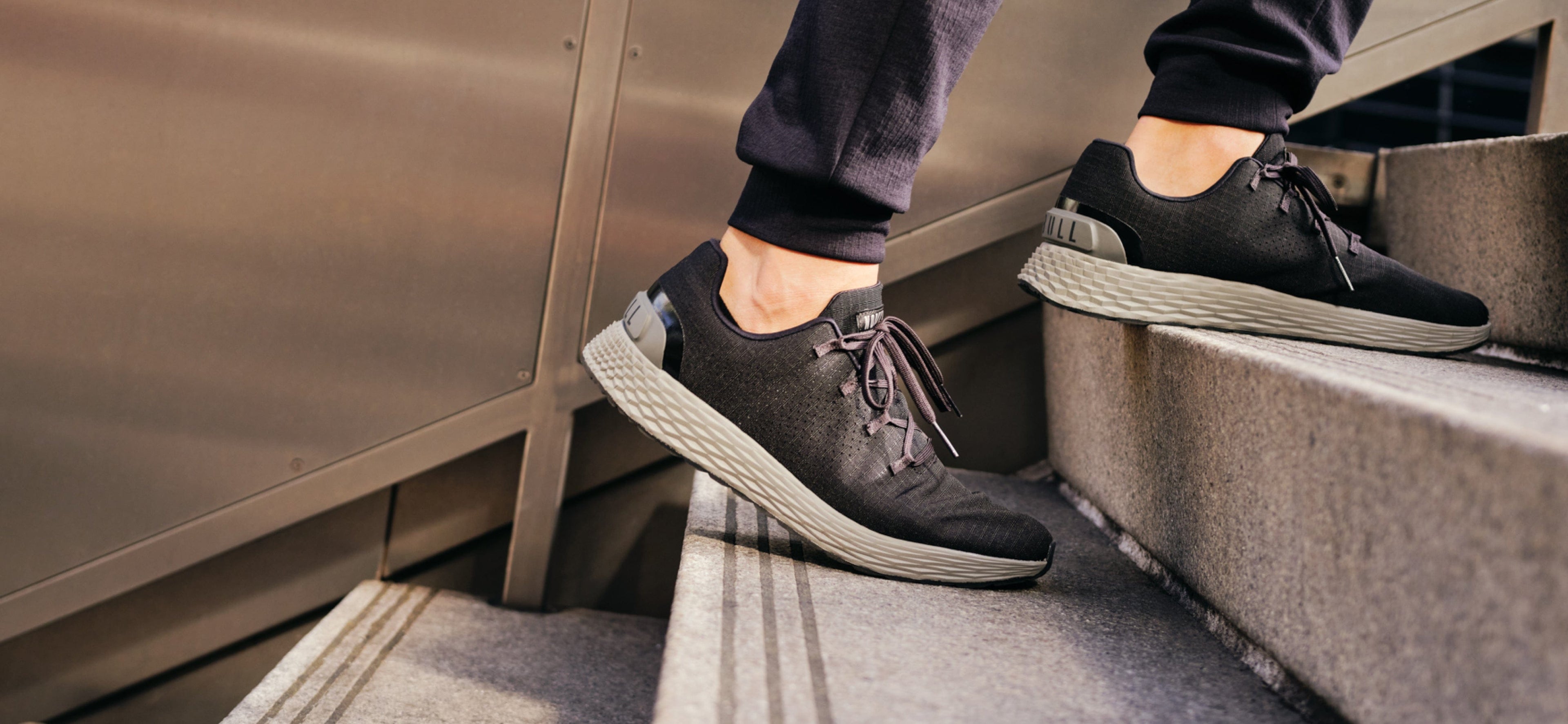 Jet Black Ash Allday 365 Men's NOBULL Shoes Walking on stairs.