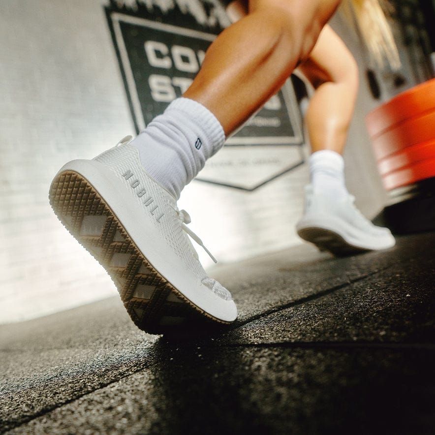 Woman wearing the classic white gum drive 2