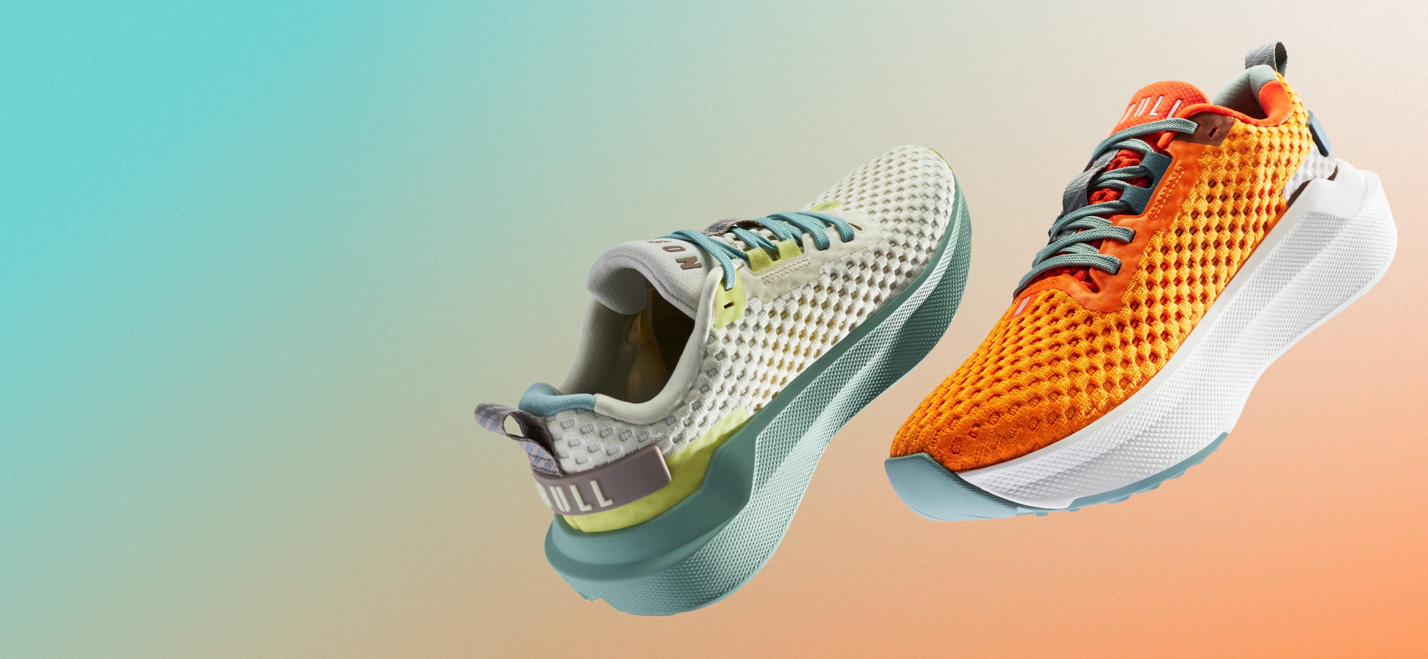 Two athletic shoes, one gray and one orange, on a gradient background