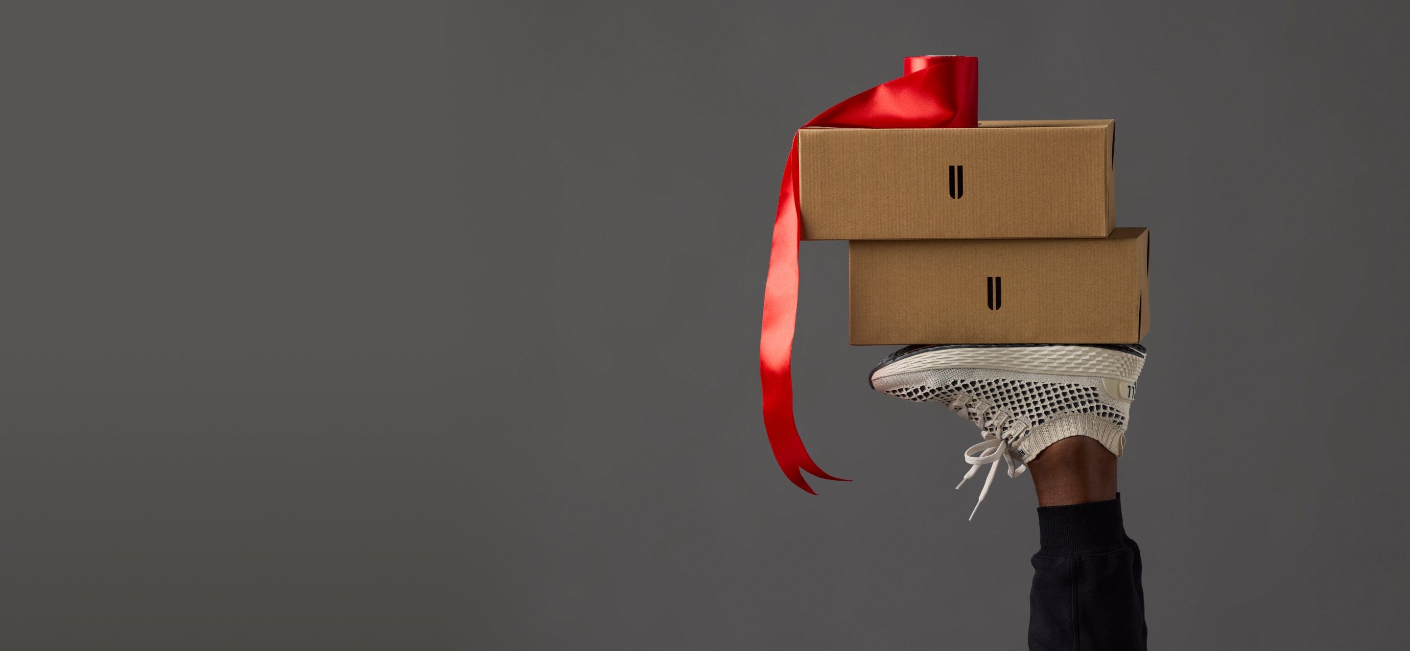 NOBULL Allday Knit Shoe Holding NOBULL Shoe Boxes for Gift Card Promo.