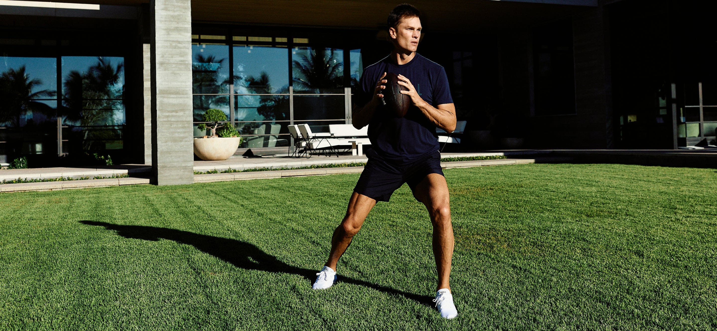 Tom Brady Throwing a Football.