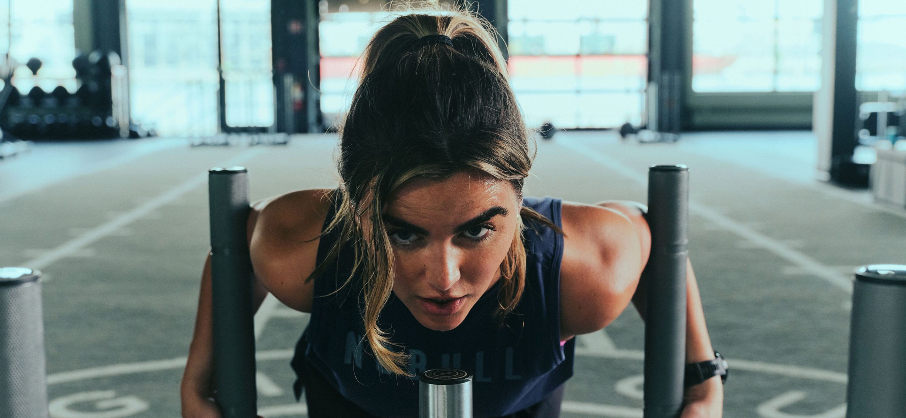 promo - woman pushing sled