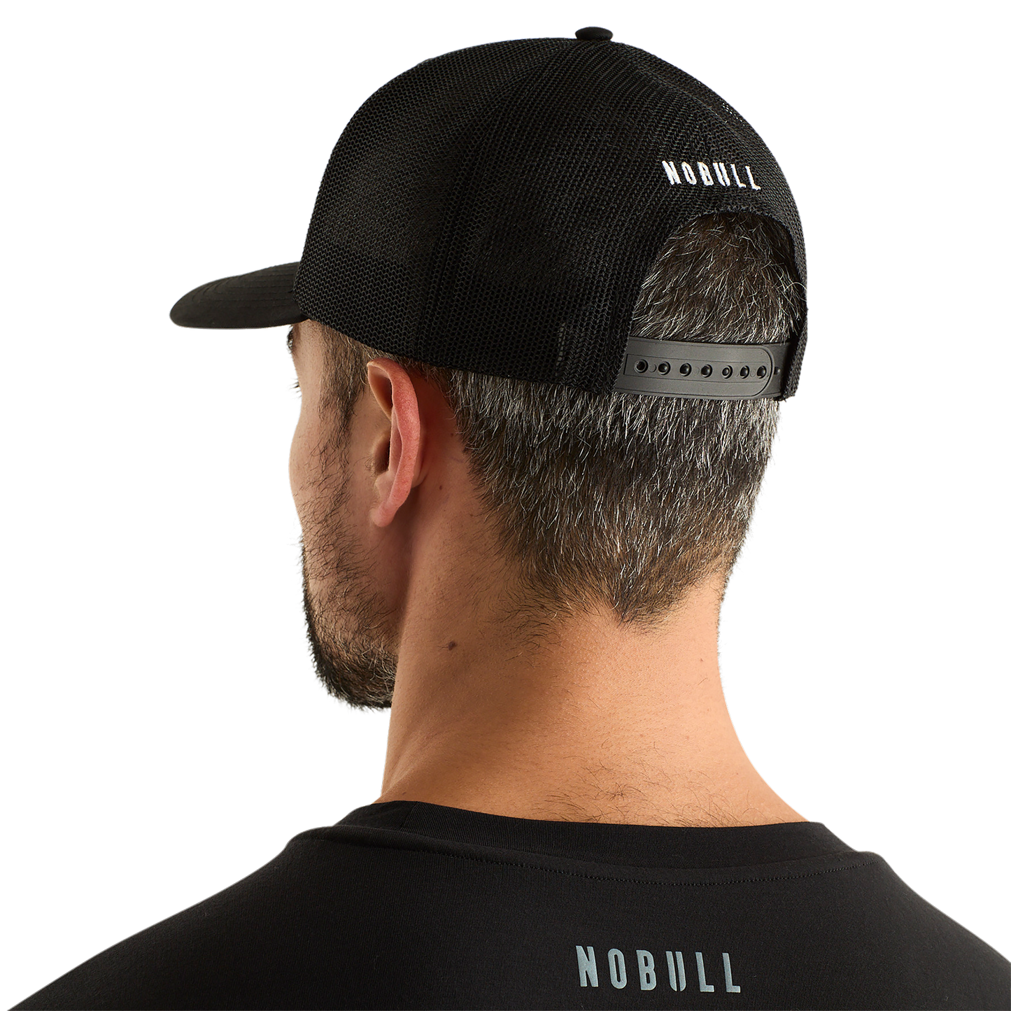 Man Wearing Black Be U Trucker Hat Back Angle.