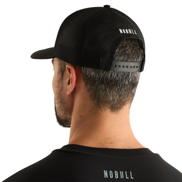 Man Wearing Black Be U Trucker Hat Back Angle.