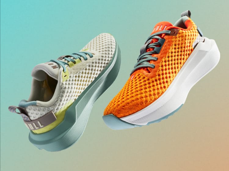 Two running shoes, one orange and one multicolor, on a gradient background
