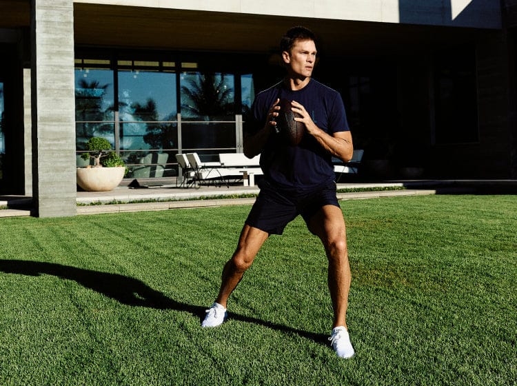 Tom Brady Throwing a Football.