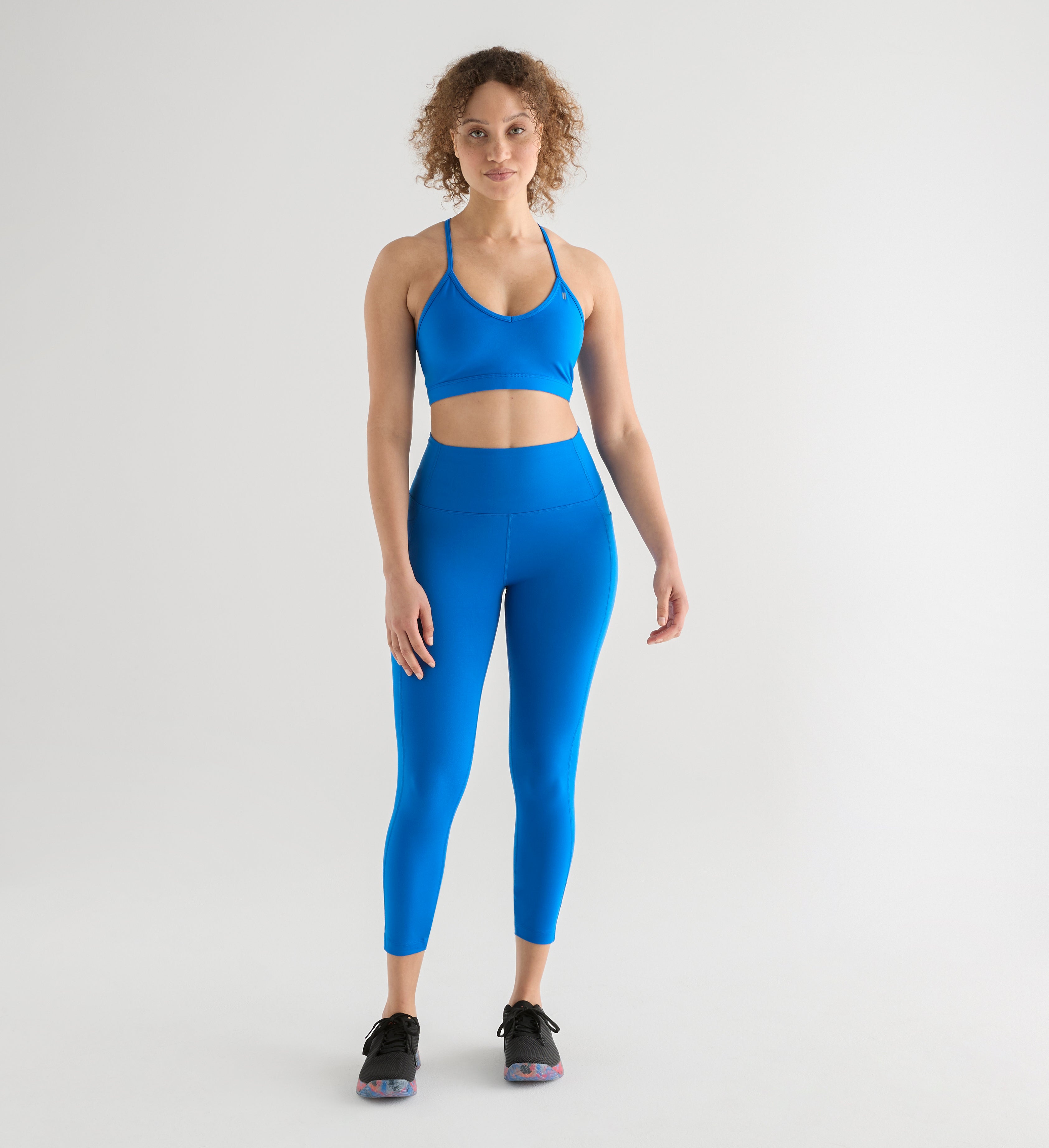 MALLAS DE TIRO ALTO CON BOLSILLO PARA MUJER DE 25 AZUL VIVIDO NOBULL