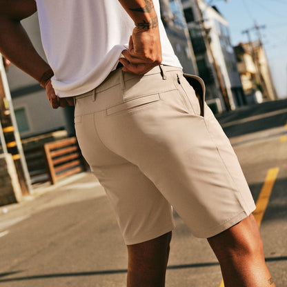 Men's Dealmaker Chino+ Short On Body Action Shot.