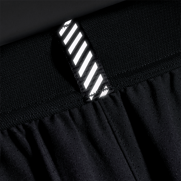 Men's Black NOBULL Drive Short 6" Reflective Tab Detail Angle.