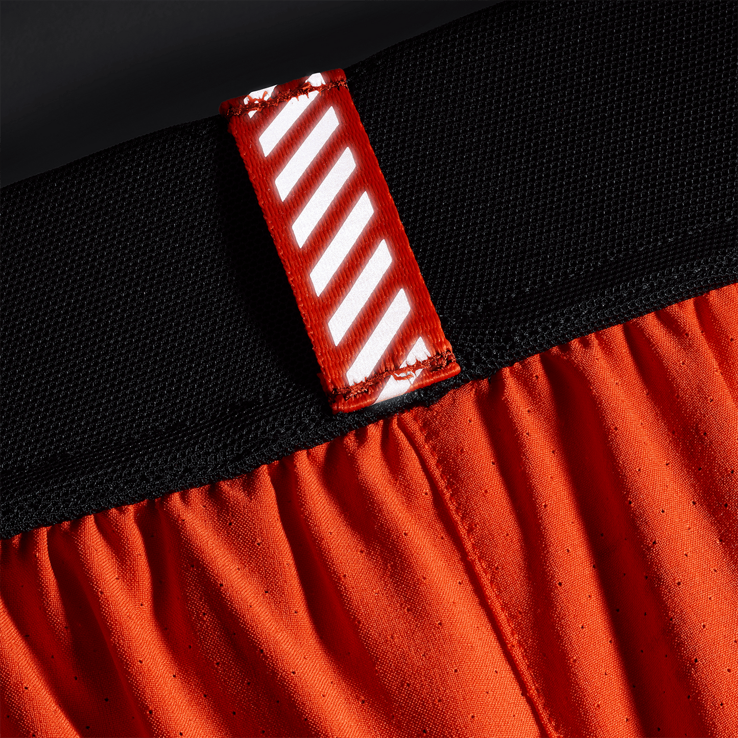 Men's Cayenne Drive Short 6" (Lined) Reflective Tab Detail Angle.