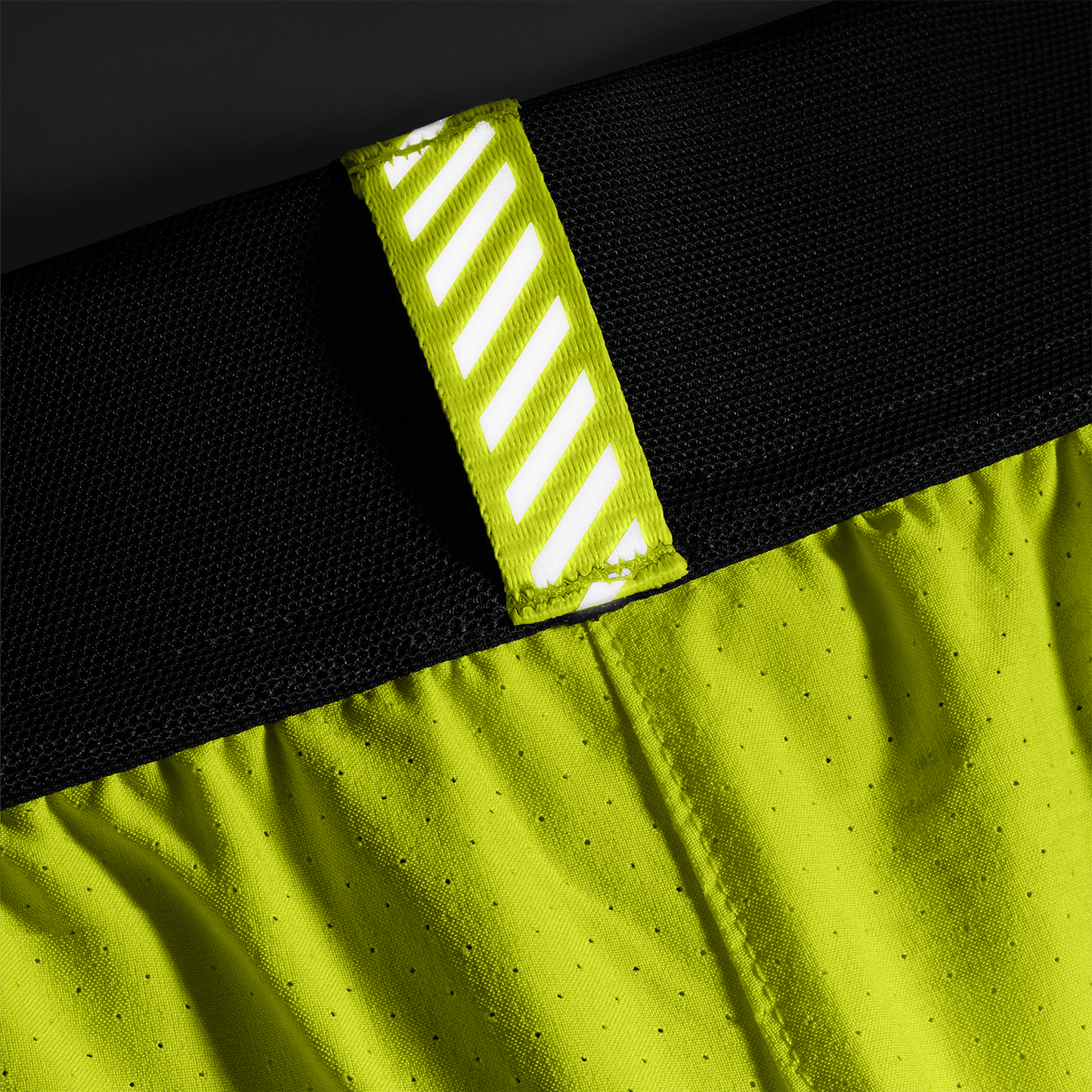 Men's Zest Drive Short 6" (Lined) Front Reflective Tab Detail Angle.