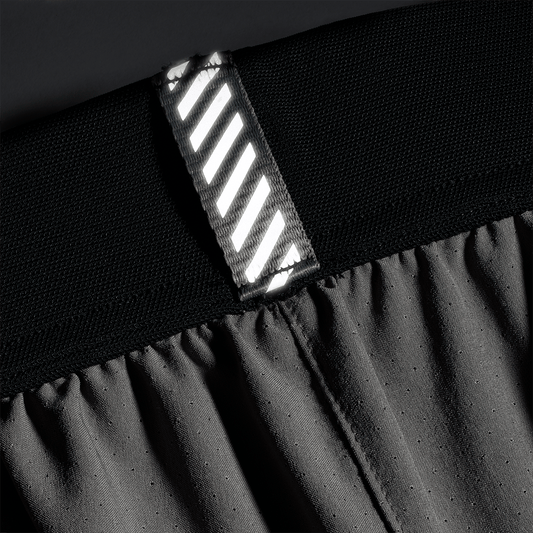 Men's Gargoyle Drive Short 6" (Unlined) Reflective Tab Detail Angle.