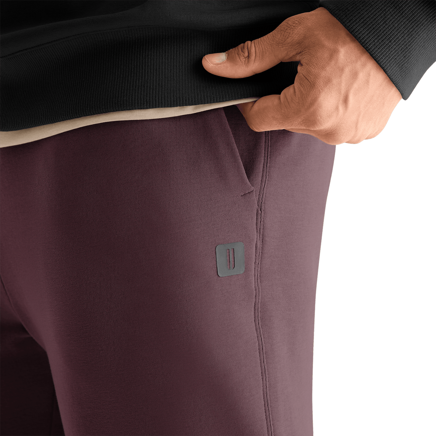 NOBULL Jogger Dark Burgundy U Logo Detail.