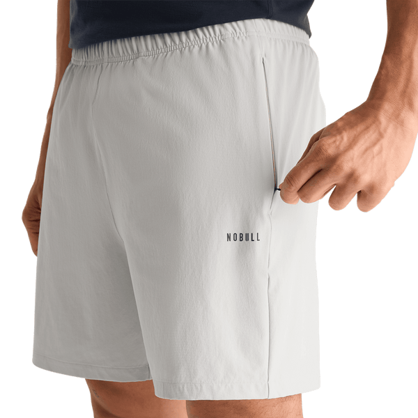 Men's Light Grey NOBULL Rep Short (Lined) 6" Pocket Detail Angle.