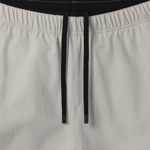 Men's Light Grey NOBULL Rep Short (Lined) 6" Drawstring Detail Angle.
