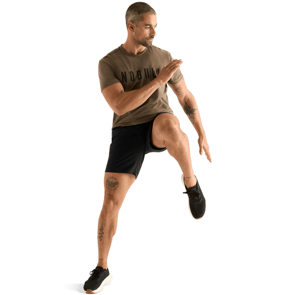 Men's Black NOBULL Rep Short 6" Action Shot Angle.