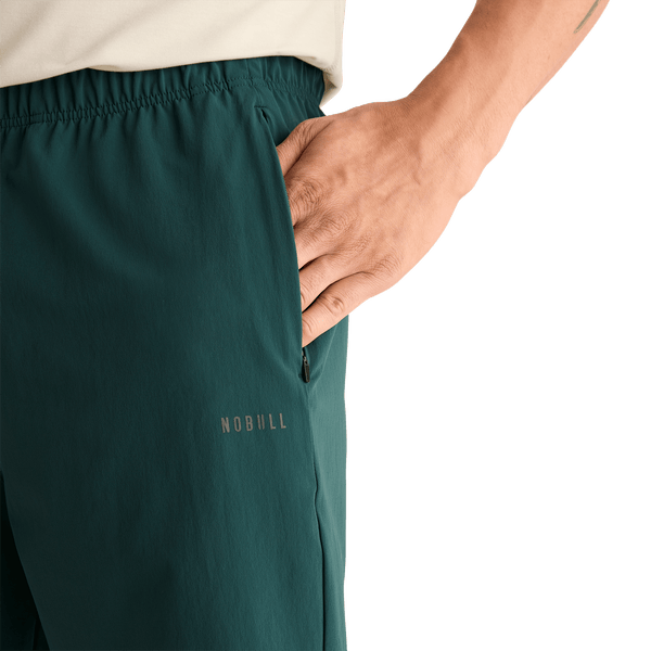 Men's Dark Ivy NOBULL Rep Short 8" Pocket Detail Angle.