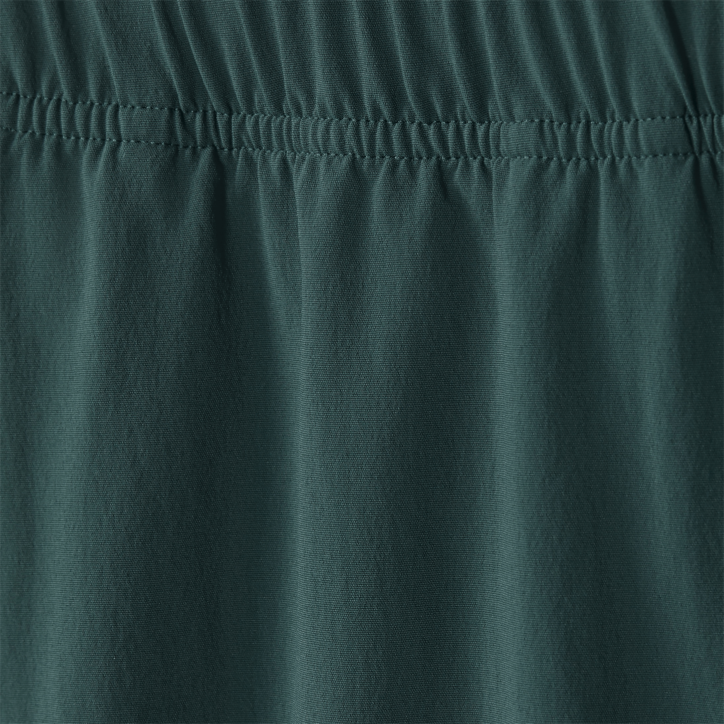 Men's Dark Ivy NOBULL Rep Short 8" Macro Detail Shot.