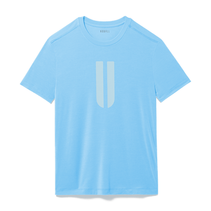 Men's Alaskan Blue U Tee Flat Lay Angle.