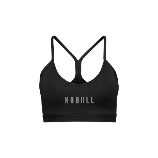 Black sports bra with 'NOBULL' logo on a white background