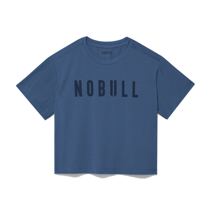 Women's Coastal Blue NOBULL Boxy Tee Flat Lay Angle.