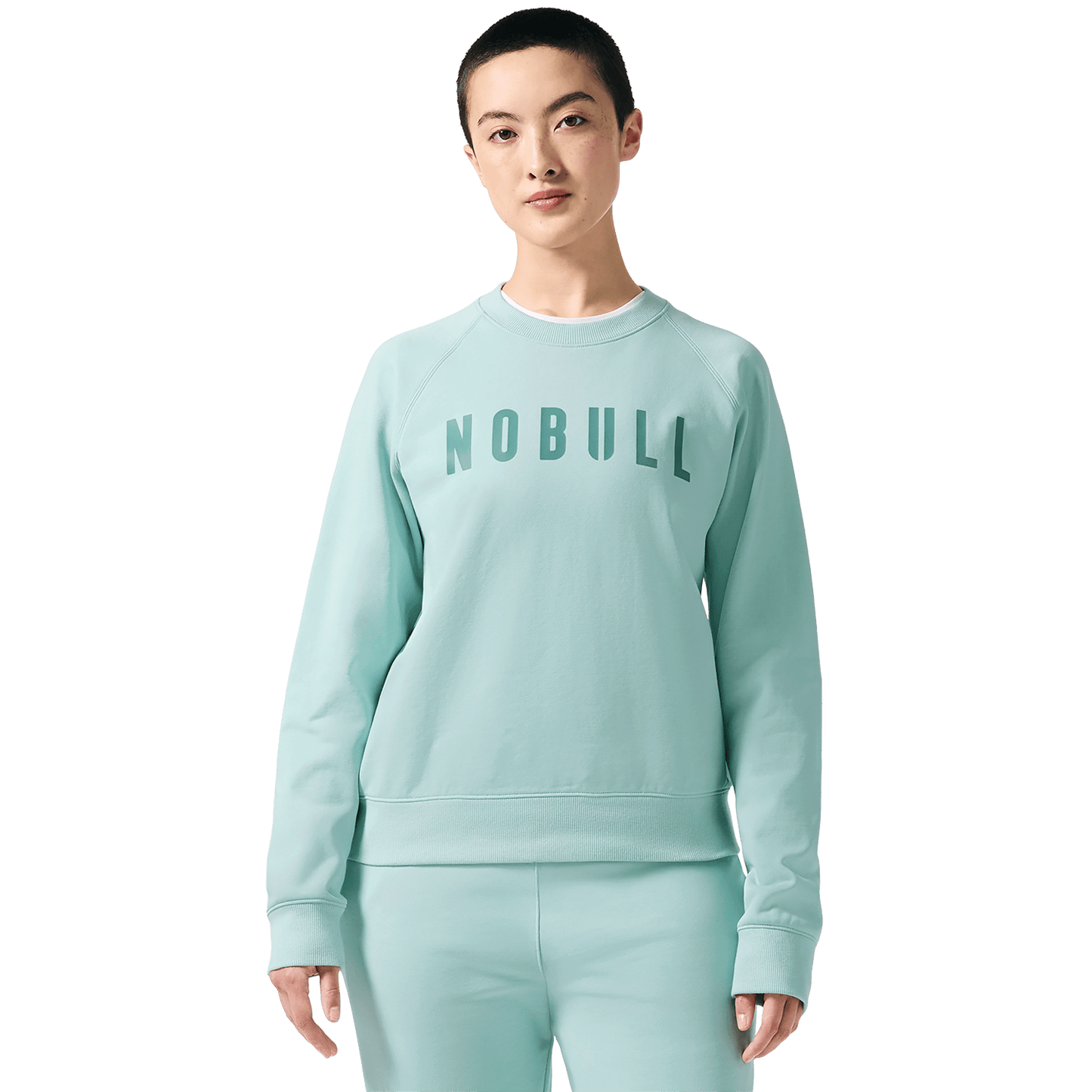 Blue Haze NOBULL Crew Sweatshirt Front On Body Angle.