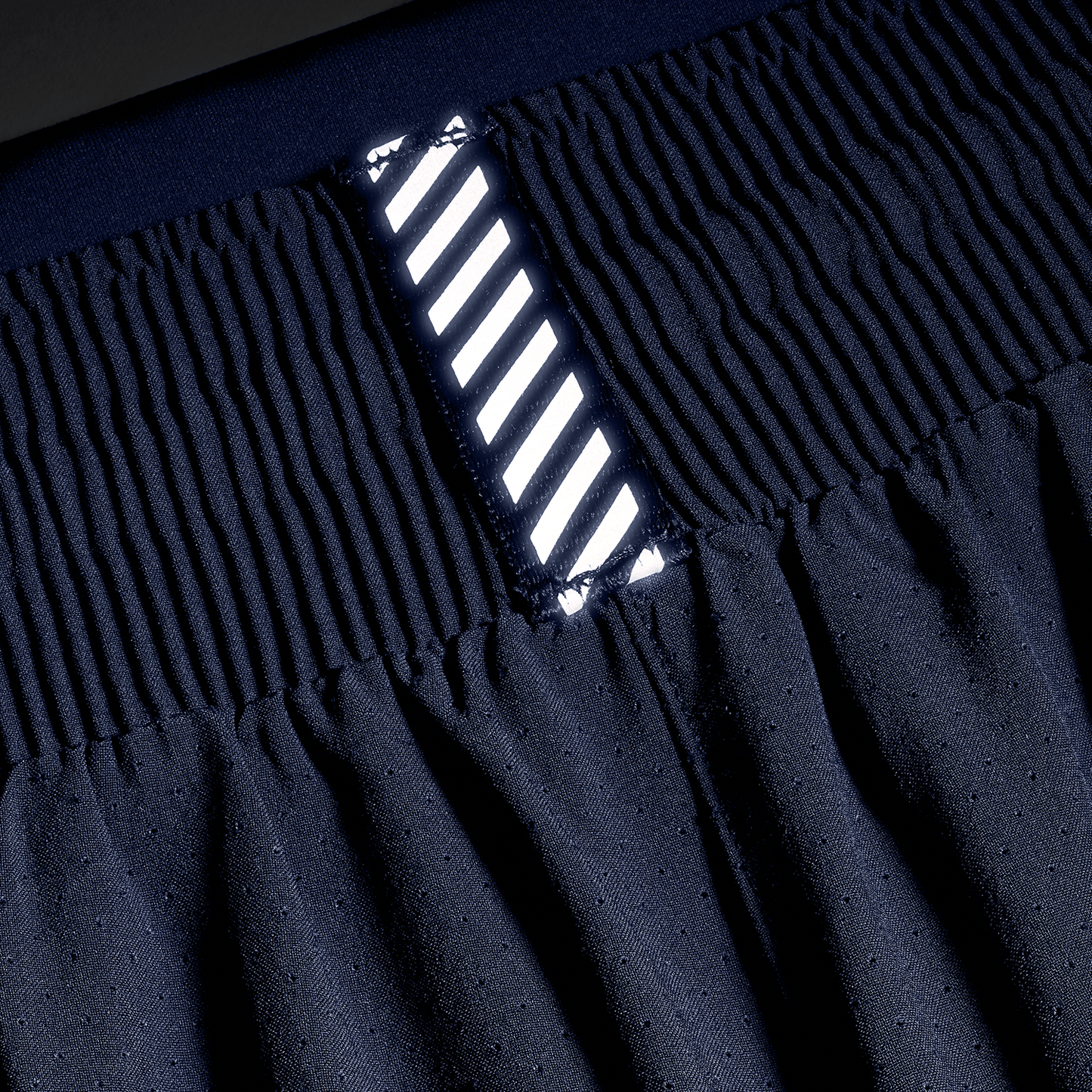 Women's Night Navy Drive 2-in-1 Short 3" Reflective Tab Detail Angle.