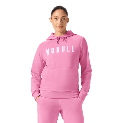 Women's Soft Pink NOBULL Hoodie Front Waist Up Angle.