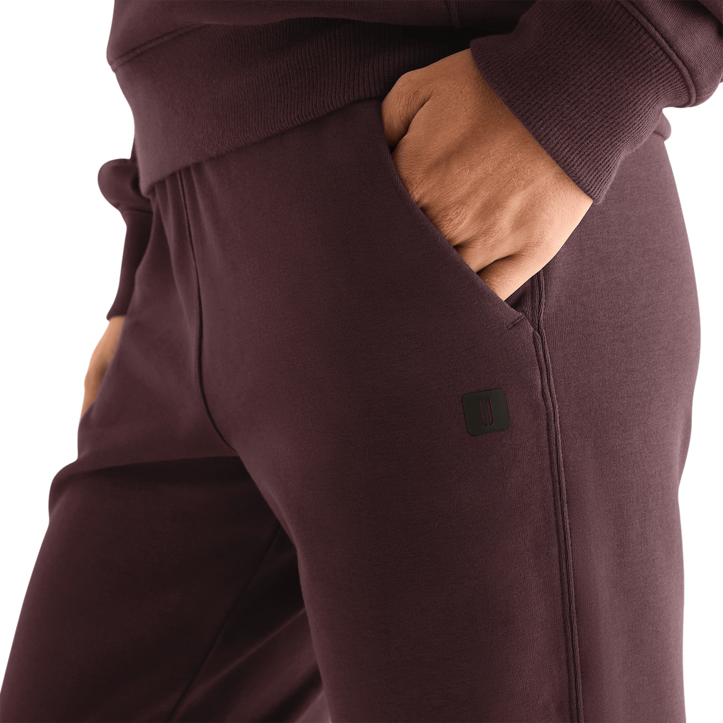 Women's NOBULL Jogger Dark Burgundy Pocket Detail.