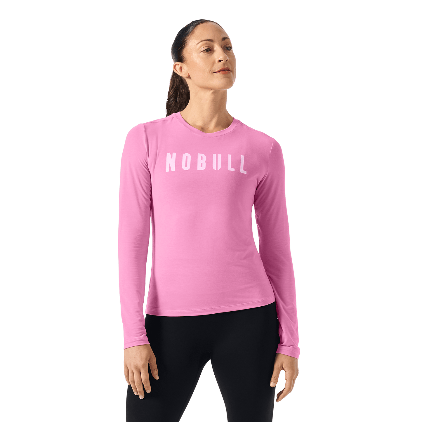 Soft Pink NOBULL Long Sleeve Tee Front Waist Up Angle.