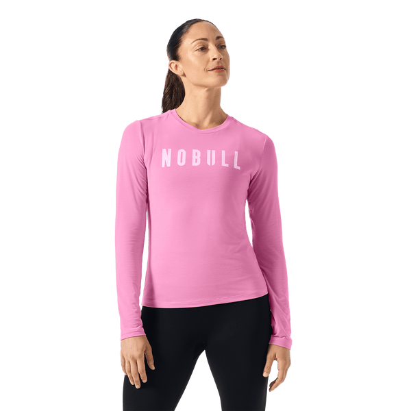 Soft Pink NOBULL Long Sleeve Tee Front Waist Up Angle.