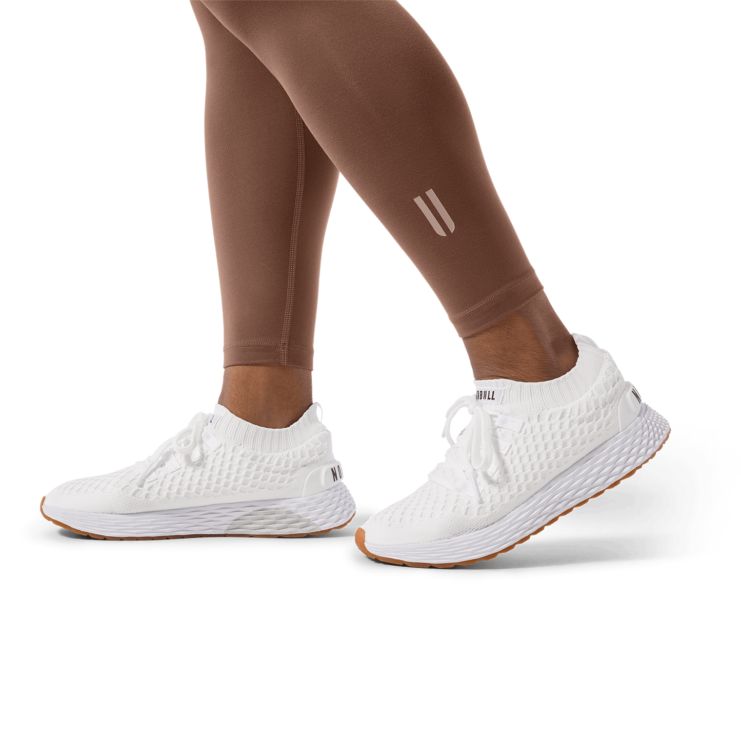 Women's Acorn U High-Rise Matte Tight 25" Footwear Detail Angle.