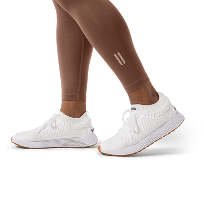 Women's Acorn U High-Rise Matte Tight 25" Footwear Detail Angle.