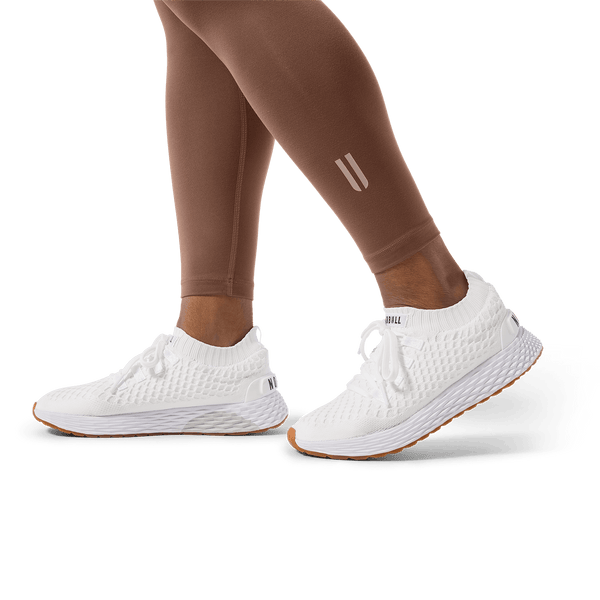 Women's Acorn U High-Rise Matte Tight 25" Footwear Detail Angle.