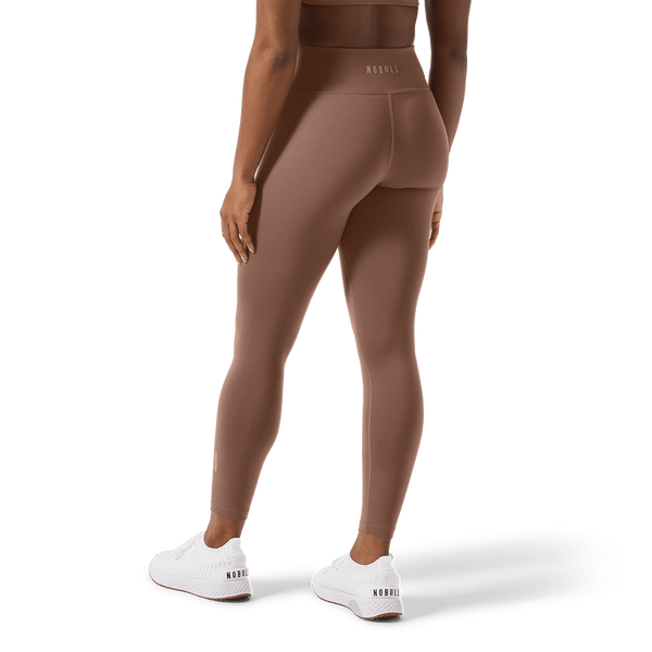 Women's Acorn U High-Rise Matte Tight 25" Back Lower Body Angle.
